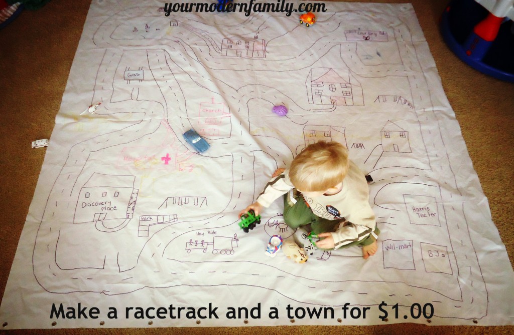 DIY Toys- make a racetrack with a shower curtain and paints