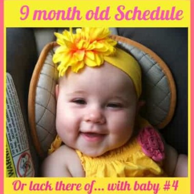 A baby smiling at the camera.