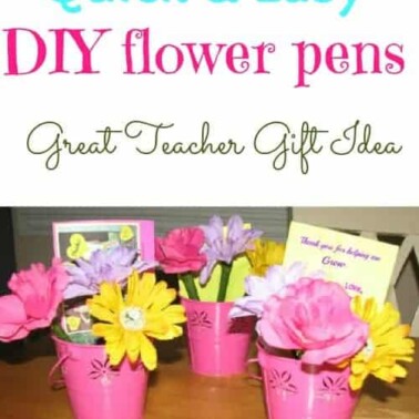 A vase of flowers on a table with text above them.