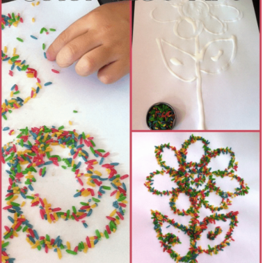A close up of a crafts made out of colored rice.