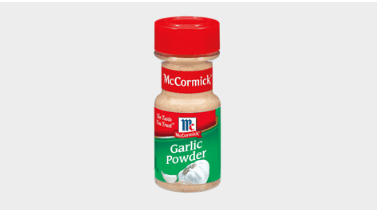 A close up of a bottle of McCormick Garlic Power.