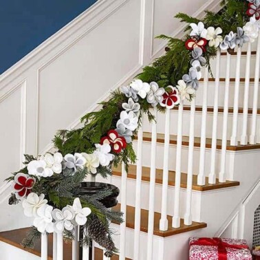 A staircase decorated for Christmas.