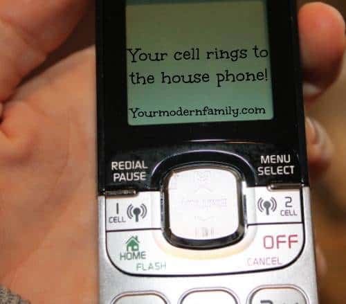 A portable house phone with text on it.