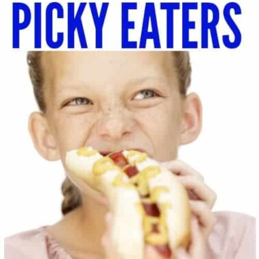 A girl eating a hot dog with text above her.