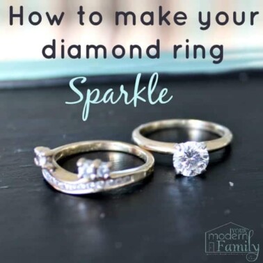 Two diamond rings sitting on a counter with text above them.