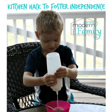 A little boy that is squirting milk from a reusable  plastic bottle onto his cereal.