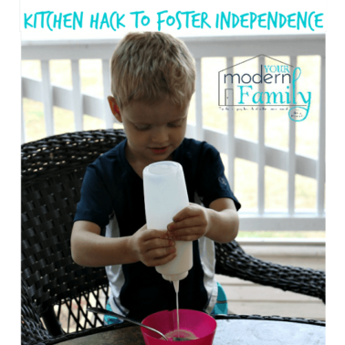 A little boy that is squirting milk from a reusable plastic bottle onto his cereal.