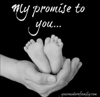 A close up of a hand holding baby's feet with text above them.