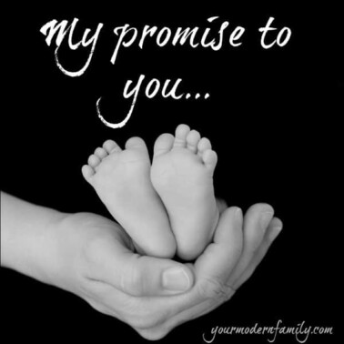 A close up of a hand holding baby's feet with text above them.