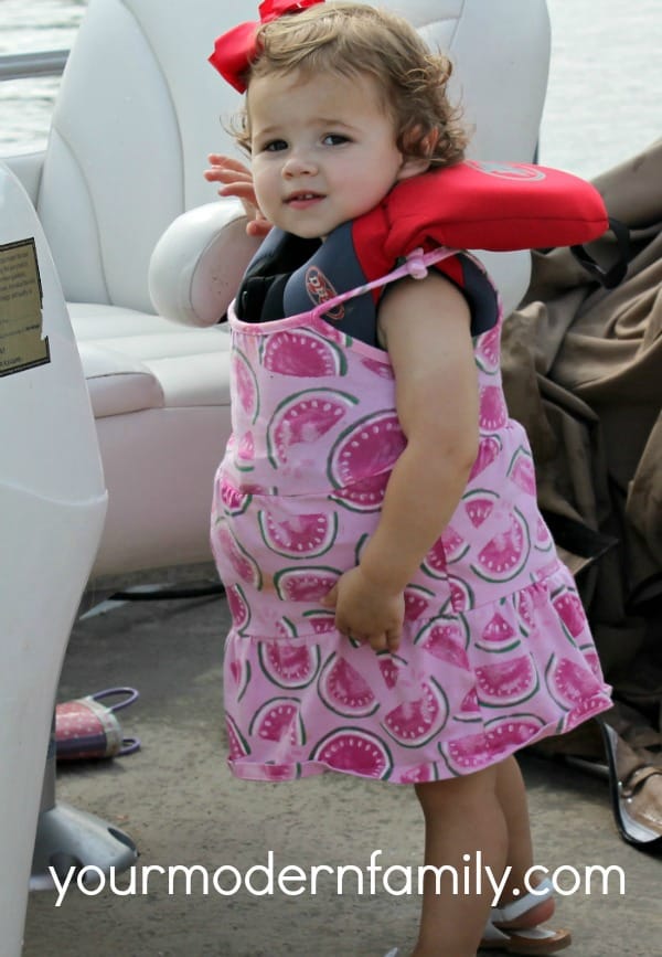 wearing a dress over her life jacket makes her happy!