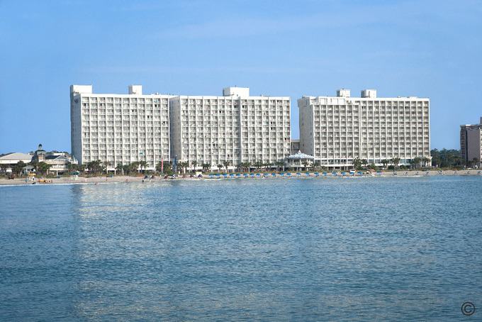 A view of hotels from the ocean.