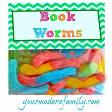 A close up of gummy worms with text above them.