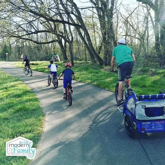 A family biking on a bike trail.