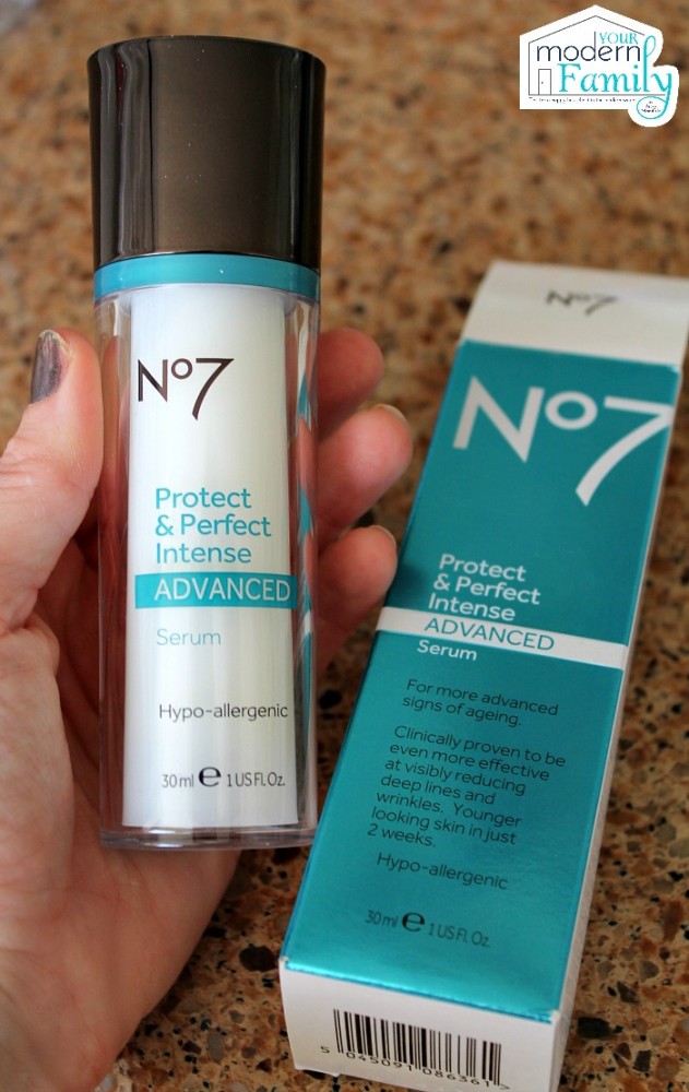 A hand holding a No 7 beauty product.