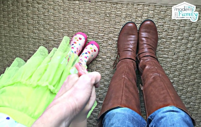 A woman and child\'s boots.