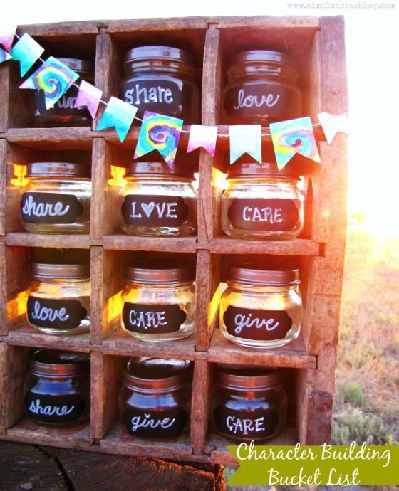 Wooden shelves with glass jars each having a positive word written on it.