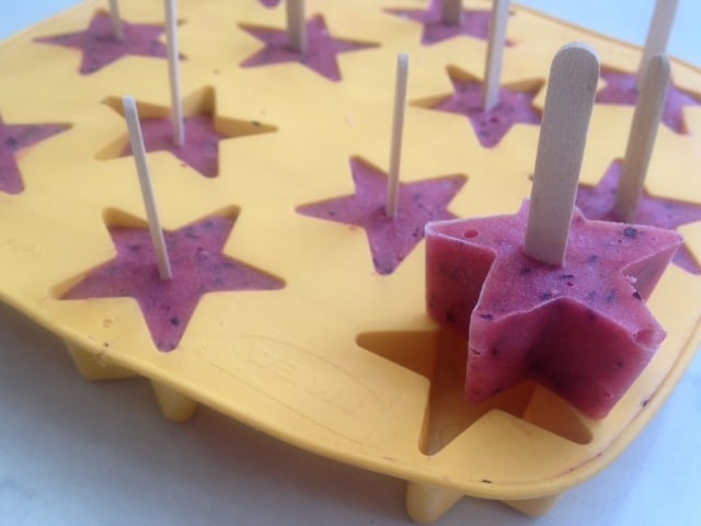 Frozen star shaped ice pops made from fruit.