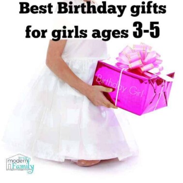 A young girl in a white dress holding a wrapped gift with text above her.