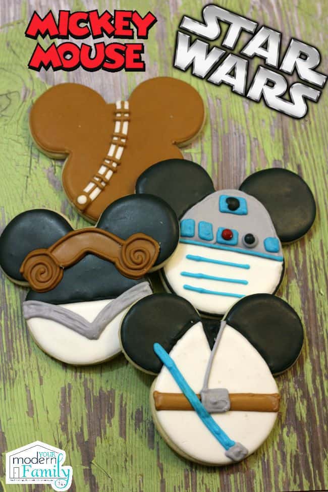 Cookies shaped and decorated like Star Wars Mickey Mouse.
