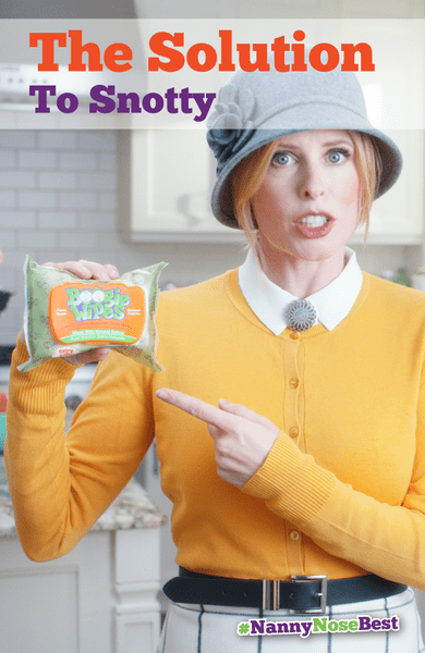 A close up of a woman pointing to a pack of Boogie Wipes.