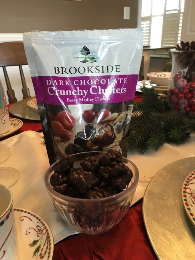  Brookside Crunchy Clusters in a glass bowl with its bag sitting on the table.