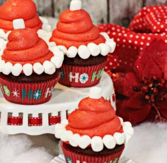 Cupcakes decorated to look like Santa's hat.