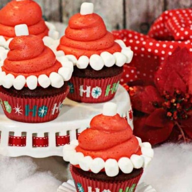Cupcakes decorated to look like Santa's hat.