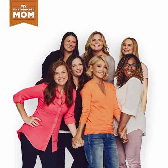 Kelly Ripa and other women posing for a photo.