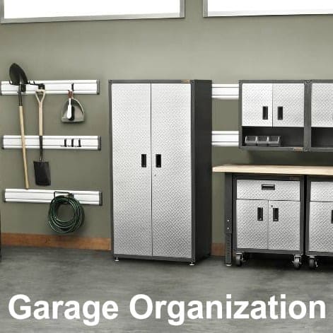 A large garage with organizational cabinets.