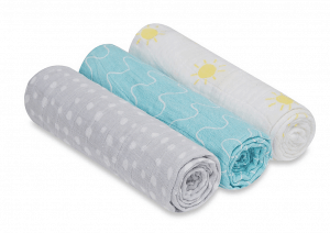 Three rolled up baby blankets.