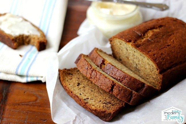 A loaf of banana bread on a plate.