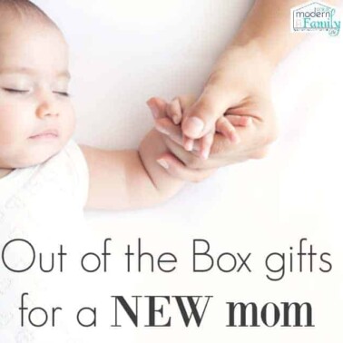A close up of a baby sleeping with a woman holding his hand with text below them.