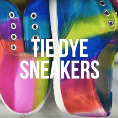 A close up of tie dye sneakers.