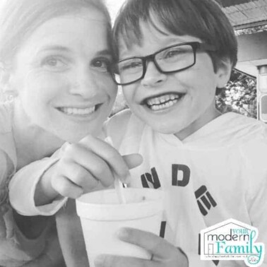 A woman and a boy posing for a photo.