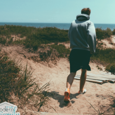 A man jogging near the beach.