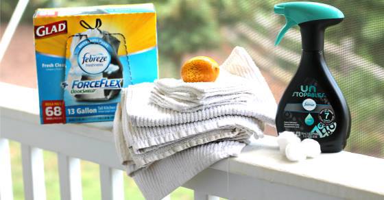 Cleaning products sitting on a porch railing.