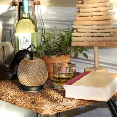 A small wooden table with items on it.