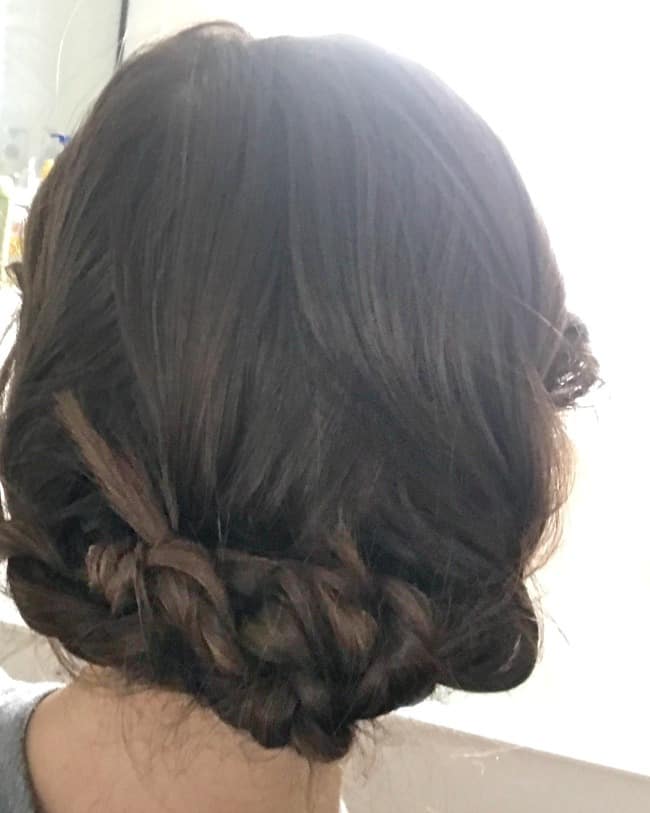 A view of a hair style from the back.