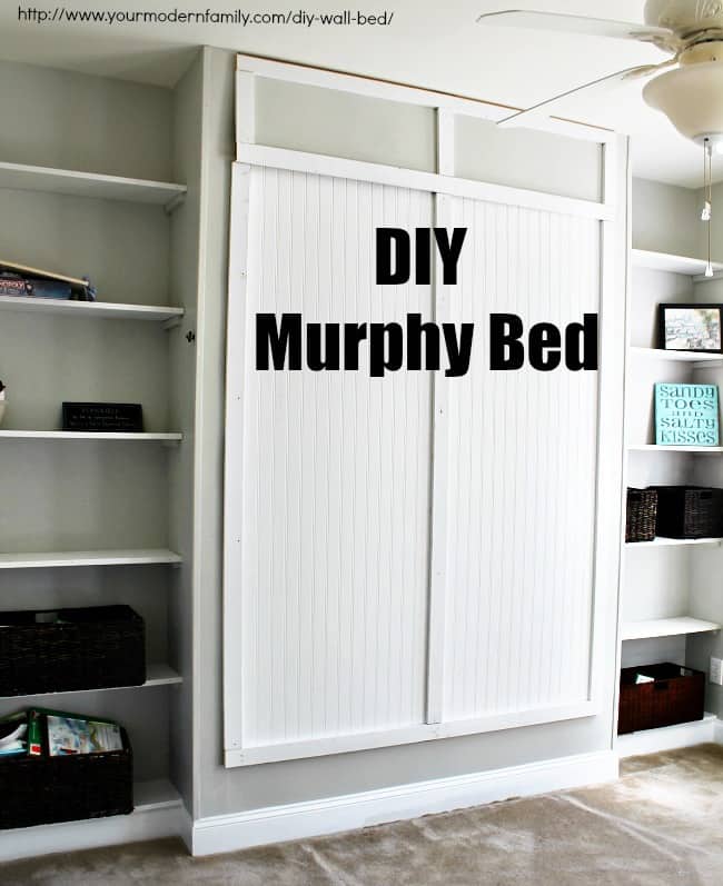 A bedroom with a Murphy Bed hidden away in the wall.