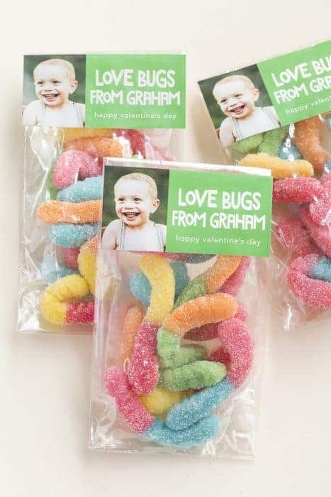 Bags of gummy worms with picture of a baby and text.