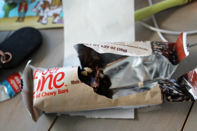 An open package of a Fiber One granola bar. 