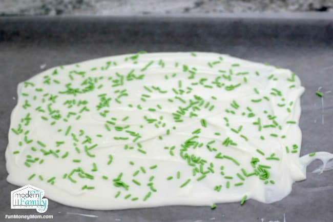 White chocolate bark with green jimmies