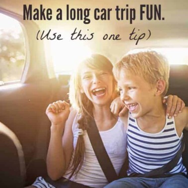 Two kids sitting in a car laughing with text above them.