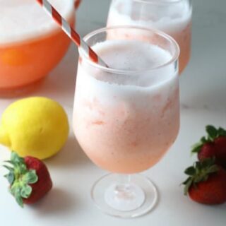 A glass of frozen strawberry lemonade 