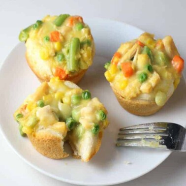 A plate of mini Chicken Pot Pie muffins on a white plate.