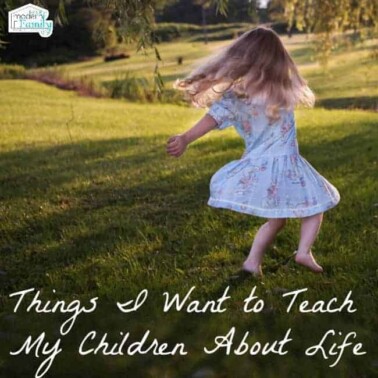 A little girl dancing in a grassy field with text below her.