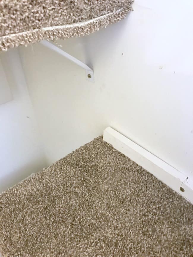 Close up of a carpeted cat climbing area.