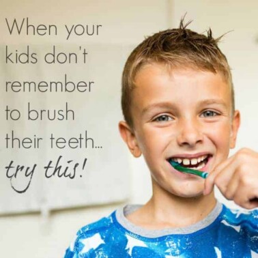 A young boy brushing his teeth with text behind him.