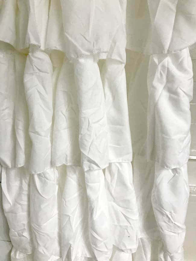 A picture of wrinkled white fabric .