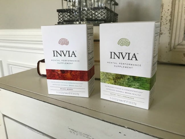 Two boxes of Invia sitting on a counter.